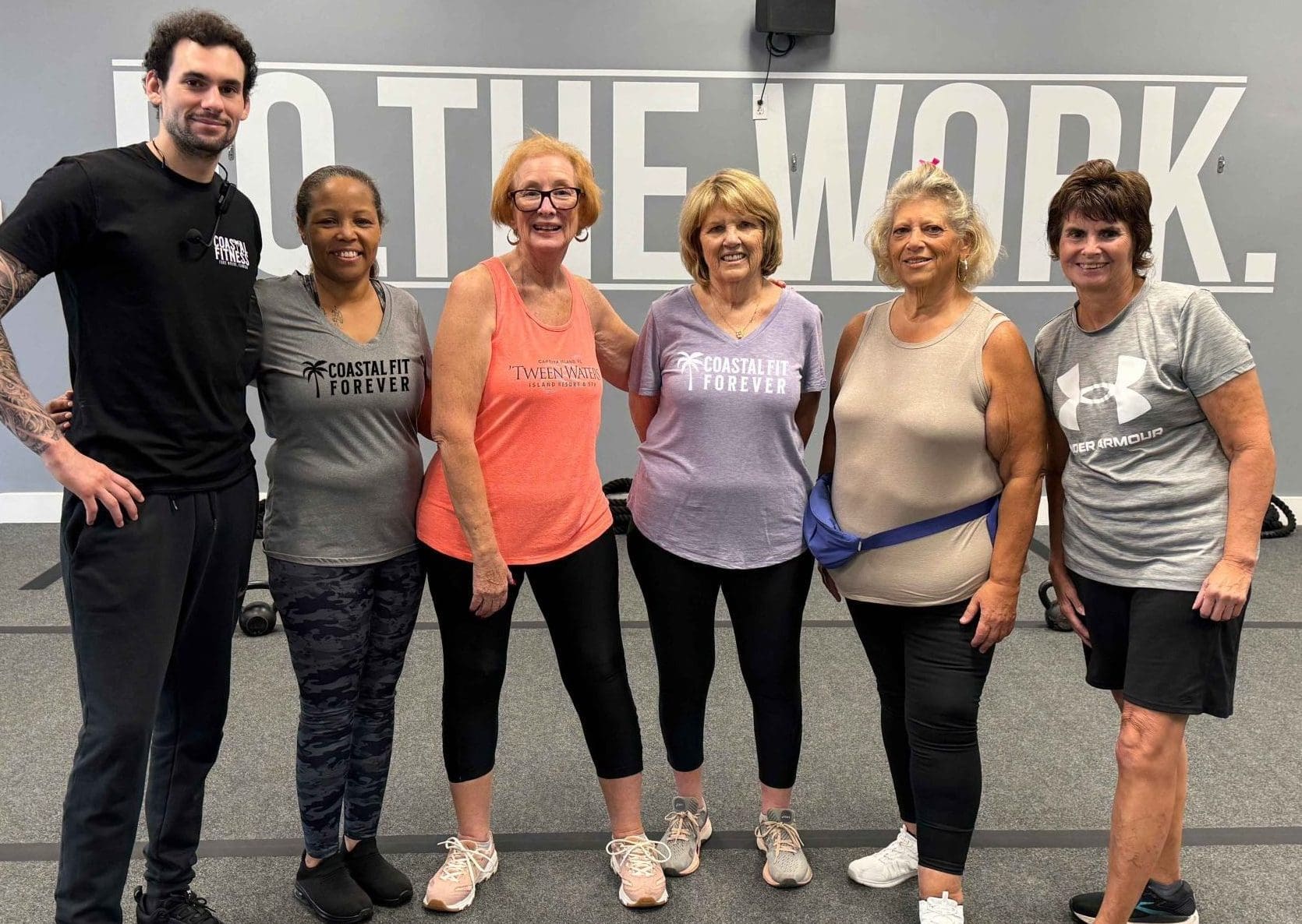 Coastal Fit Forever senior fitness class members pose for a photo